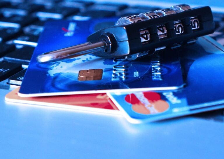Padlock secured across a stack of credit cards