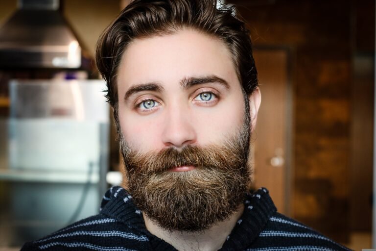 Man with a pensive, distant stare lost in thought