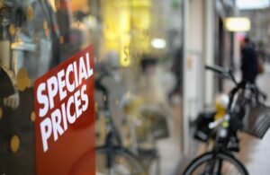Storefront special prices sign representing how to start affiliate marketing with no audience